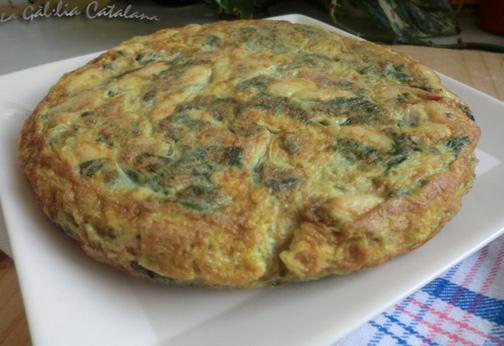 Truita de mongetes, cansalada i espinacs frontal